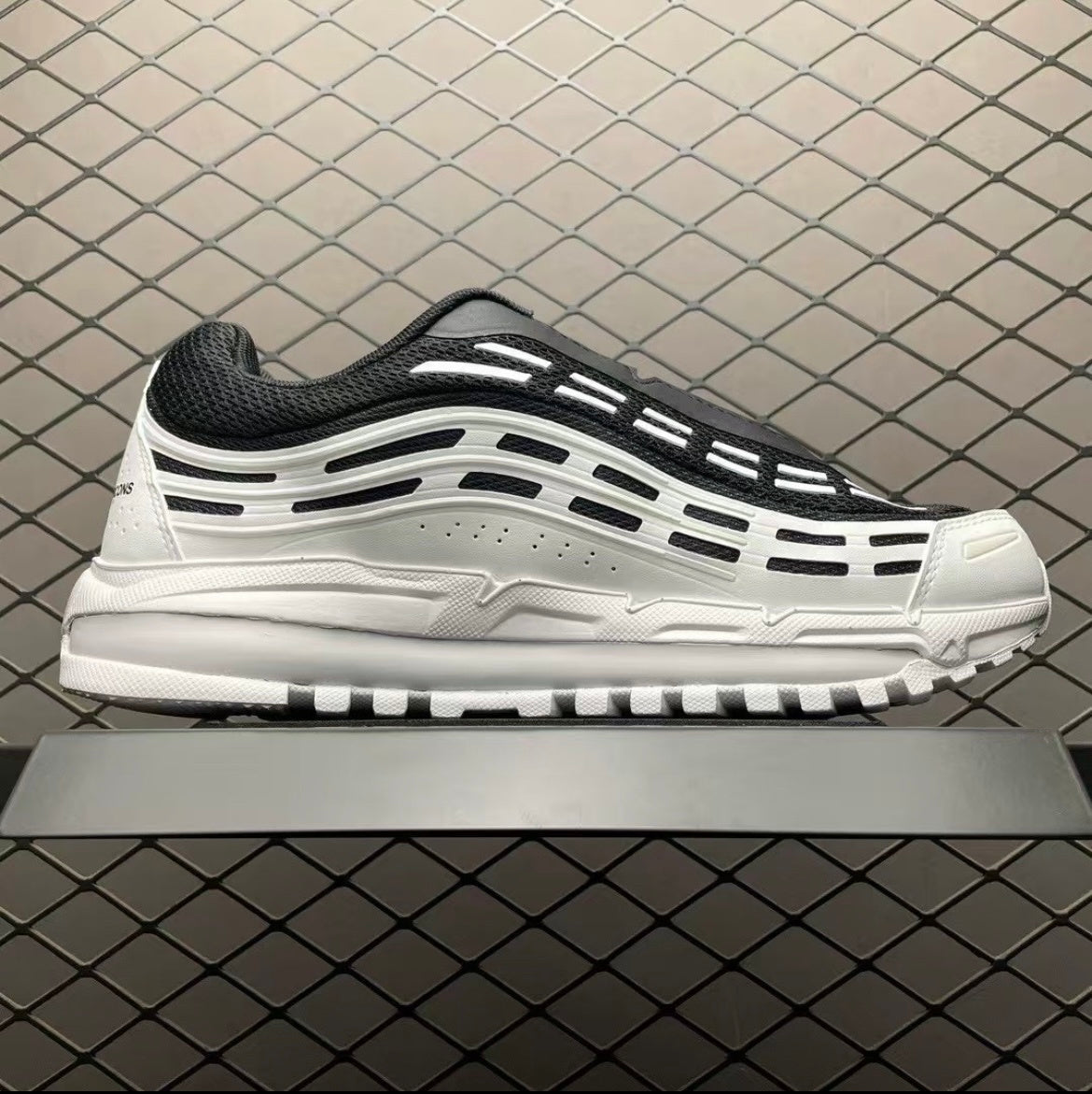 Nike Air Max TL 2.5 CDG Homme Plus in Black White HJ6539-101 - product image from the listing.
