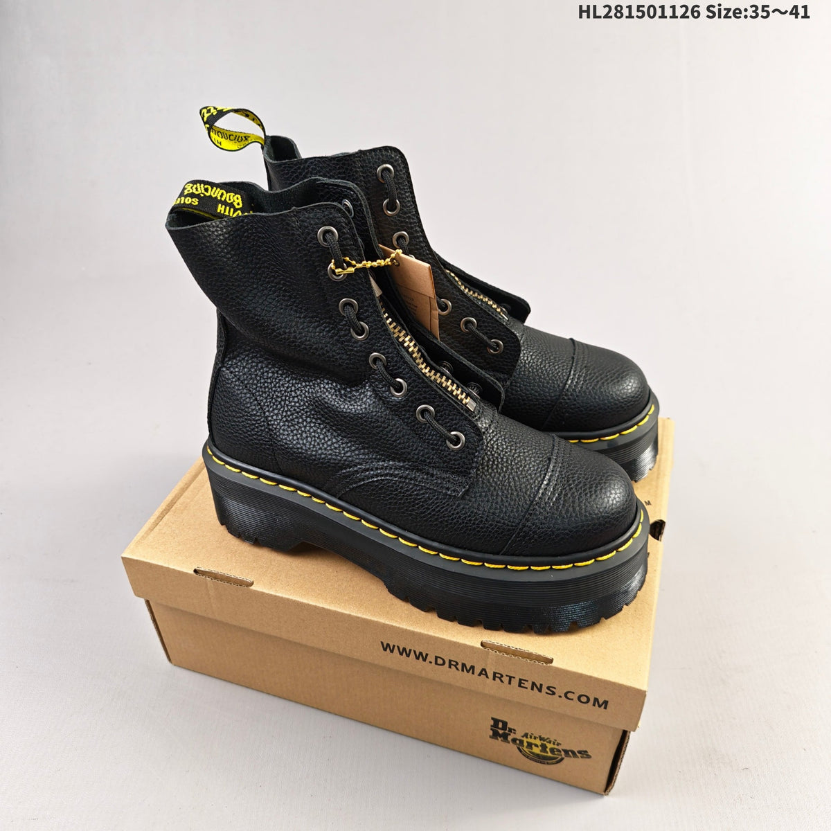 Dr. Martens 1460 Platform Lace-Up Boots, in Black and Brown - product image from the listing.