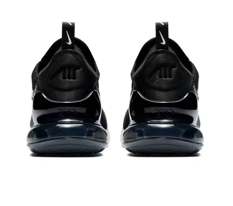 Nike Air Zoom Sneaker in Black and White - product image from the listing.