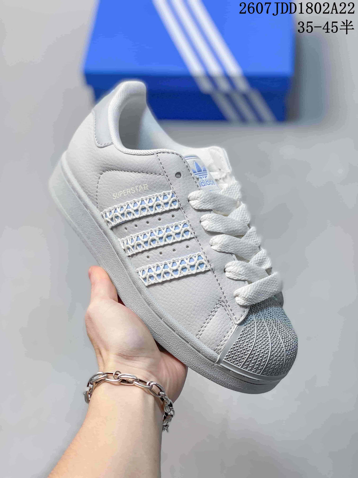 Adidas Superstar Sneakers Lavender and in White HQ2646 - product image from the listing.