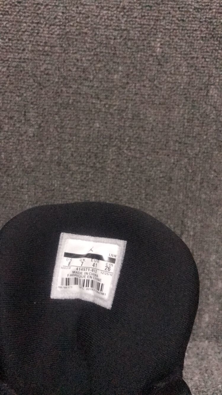 Air Jordan 13 Retro Cap and Gown Sneakers in Black - product image from the listing.