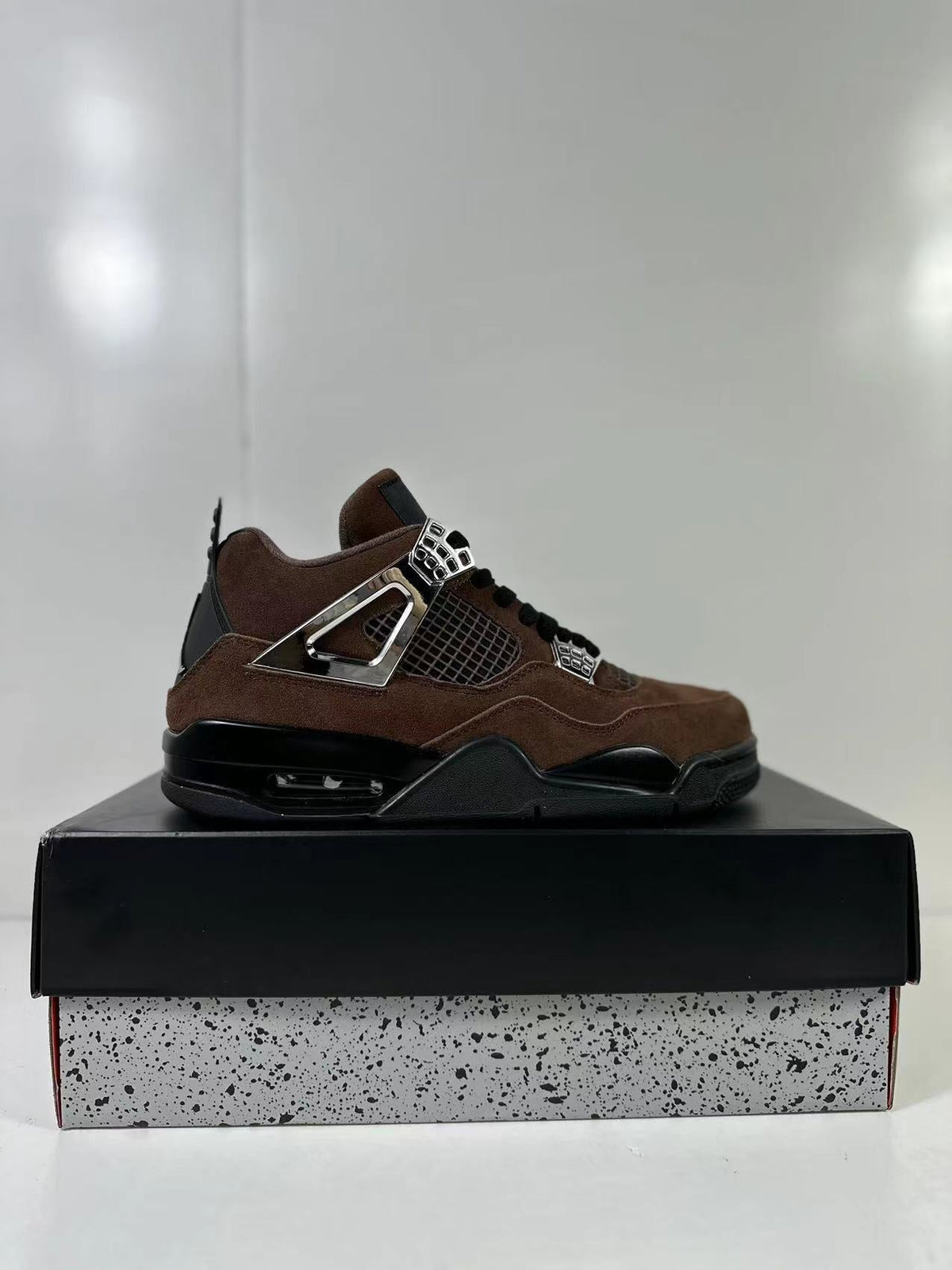 Air Jordan 4 Retro Brown Black AQ9129-002 - product image from the listing.