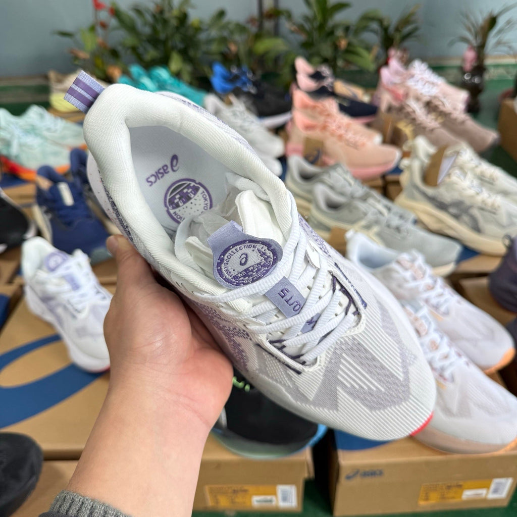 ASICS NOVABLAST 5 LE Running Shoes in White Purple - product image from the listing.