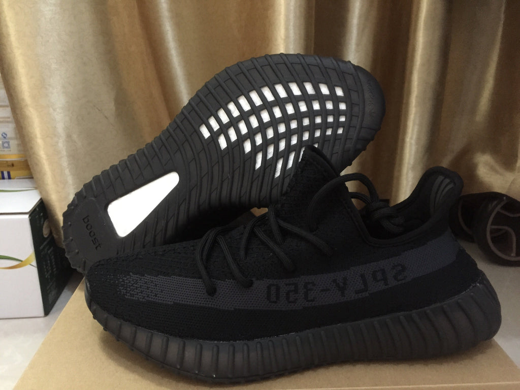 Adidas Yeezy Boost 350 V2 Sneakers in Black Knit - product image from the listing.