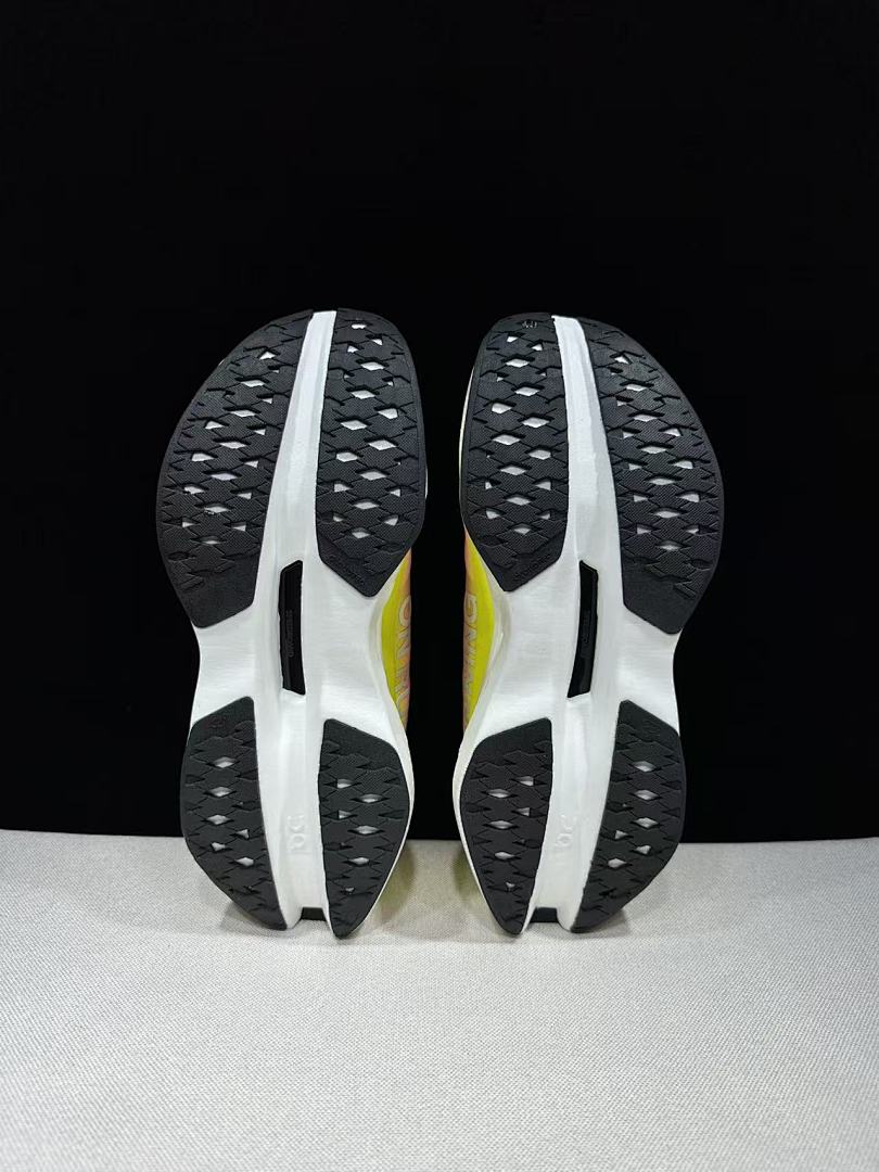 On Cloudboom Max Running Shoes, in White Pink Yellow - product image from the listing.