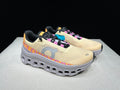 On Cloudmonster Running Shoes, in Pale Yellow and Orange - product image from the listing.