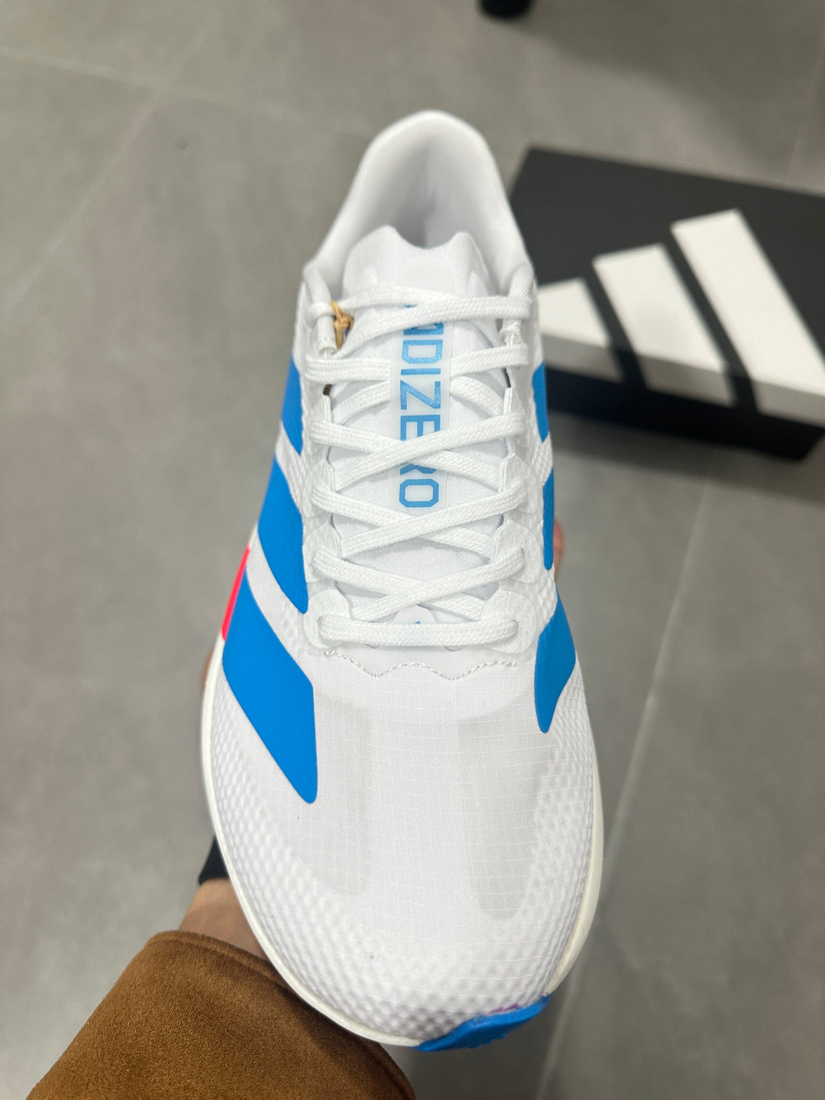 Adidas Lightstrike Pro Running Shoes in White Blue Red KJ3596 - product image from the listing.