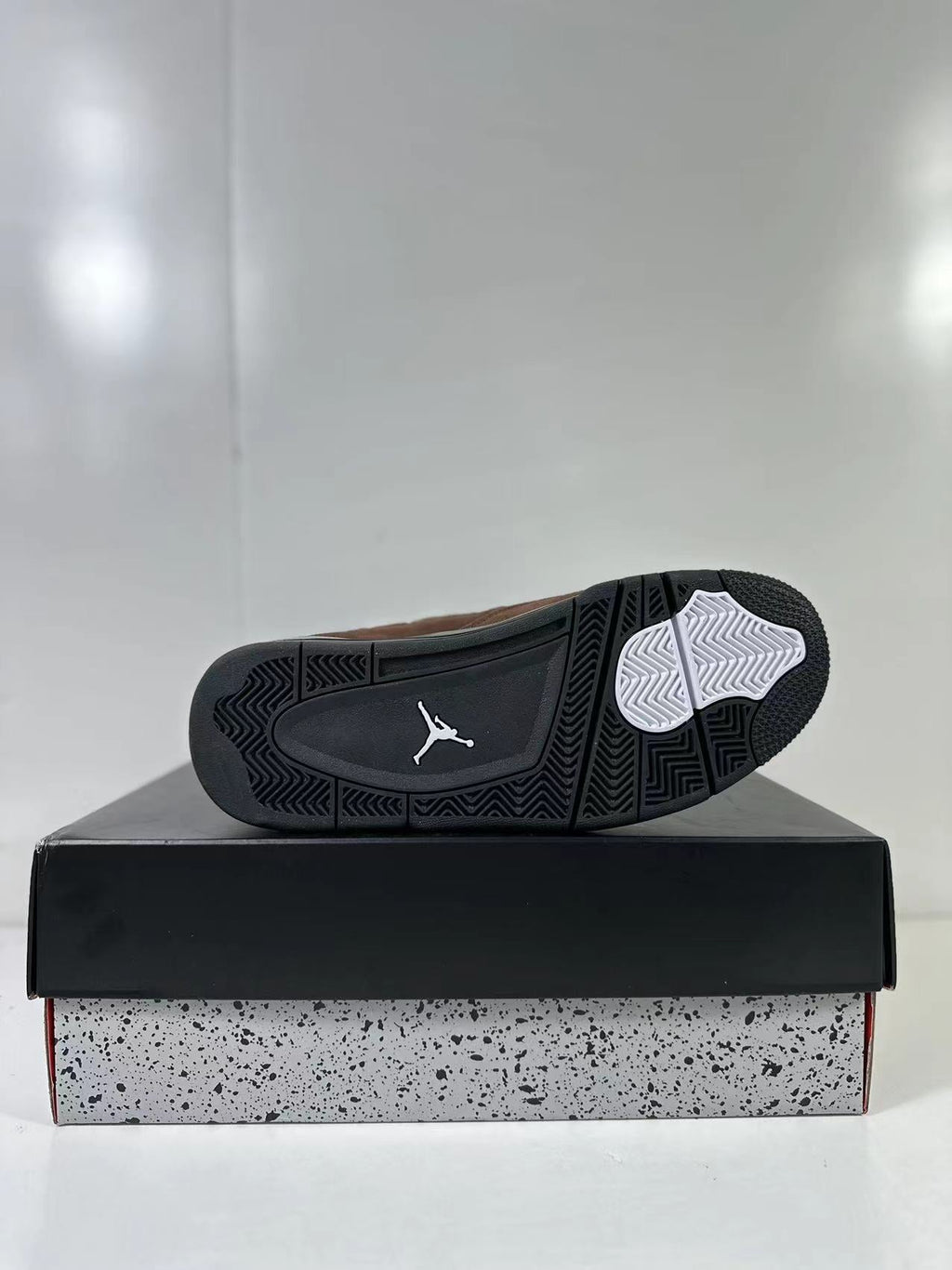 Air Jordan 4 Retro Brown Black AQ9129-002 - product image from the listing.