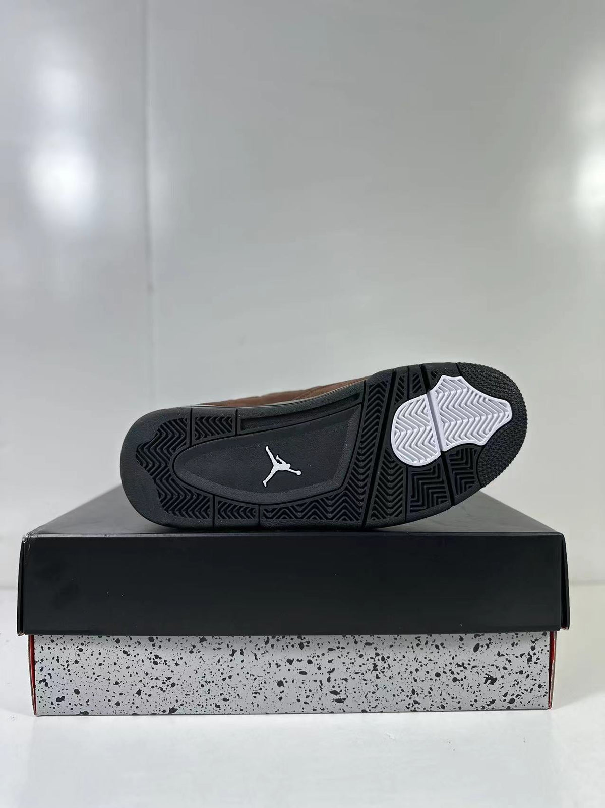Air Jordan 4 Retro Brown Black AQ9129-002 - product image from the listing.