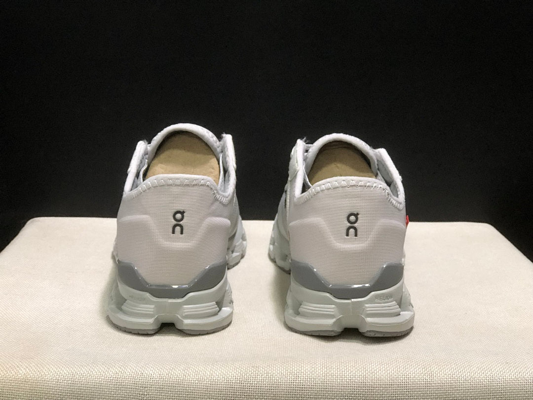 On Cloud X 4 AD Sneakers in Wolf/Alloy in Light Gray - product image from the listing.