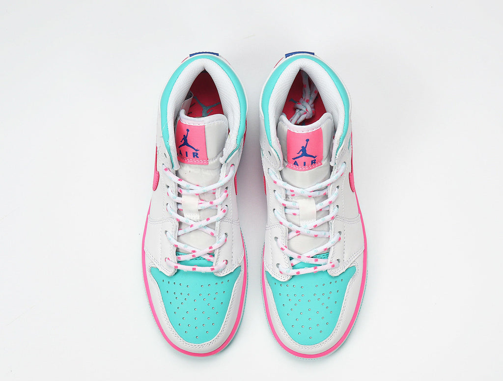 Jordan 1 Mid Sneakers in White Pink Turquoise 555112-102 - product image from the listing.
