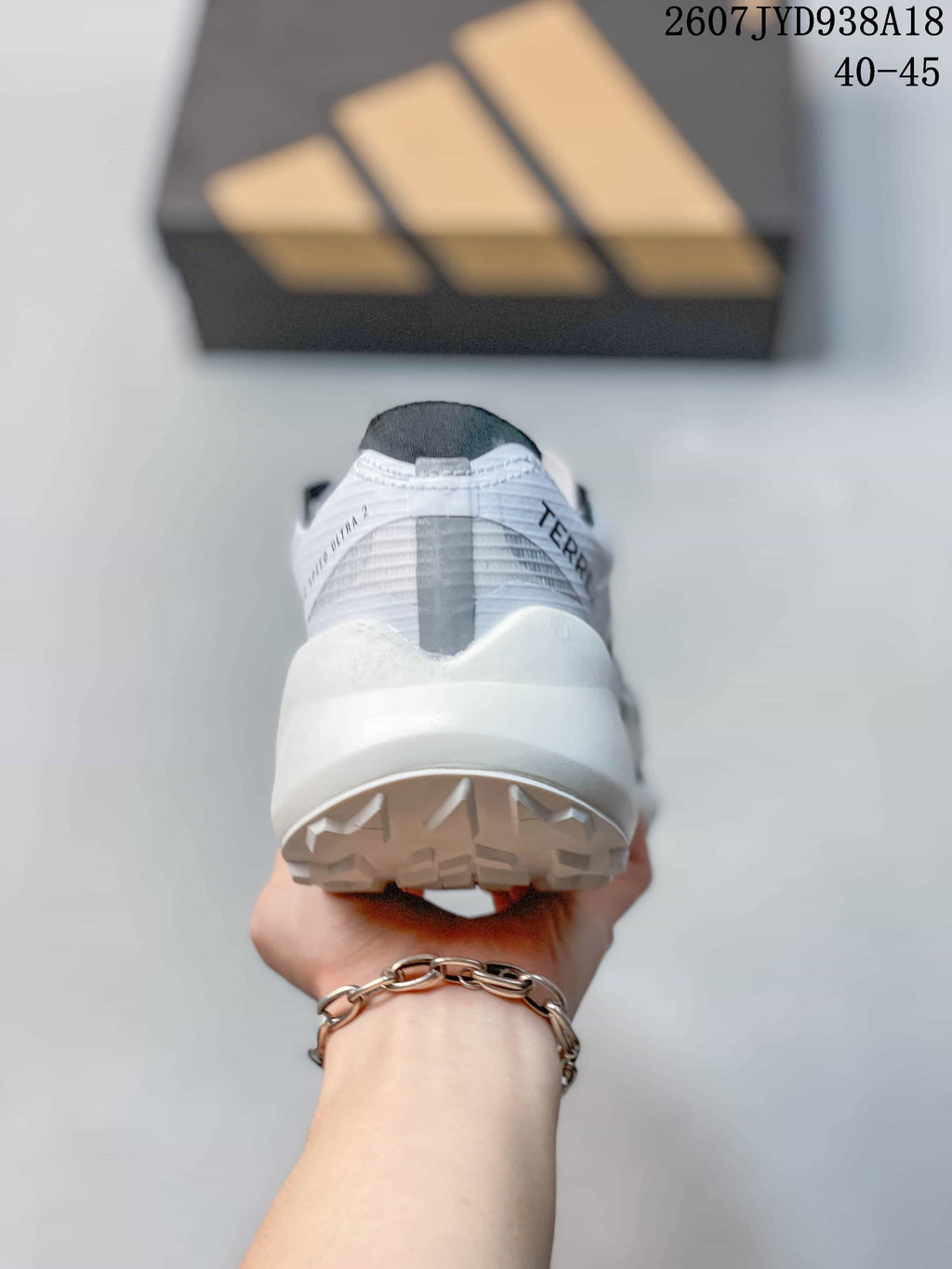 Adidas Adizero Evo SL 2 Running Shoes in White Black 2607TYD938A18 - product image from the listing.