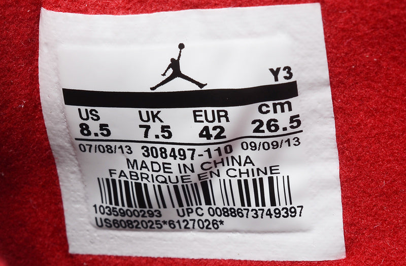 Air Jordan 4 Retro High-Top Sneakers in White and Red - product image from the listing.