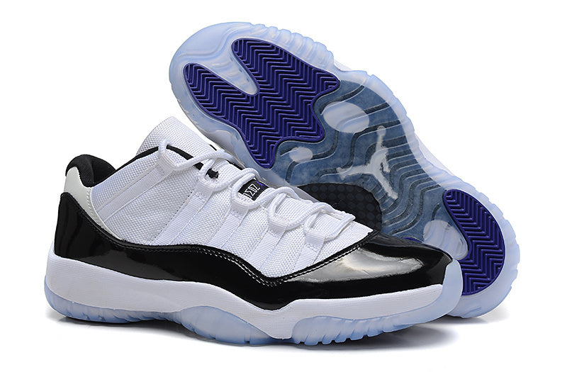 Air Jordan 11 Low Basketball Sneakers in White Black - product image from the listing.