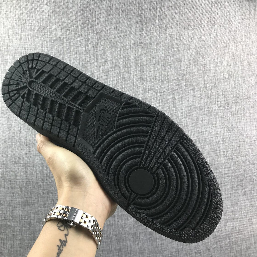 Air Jordan 1 Mid Sneakers, in Black - product image from the listing.