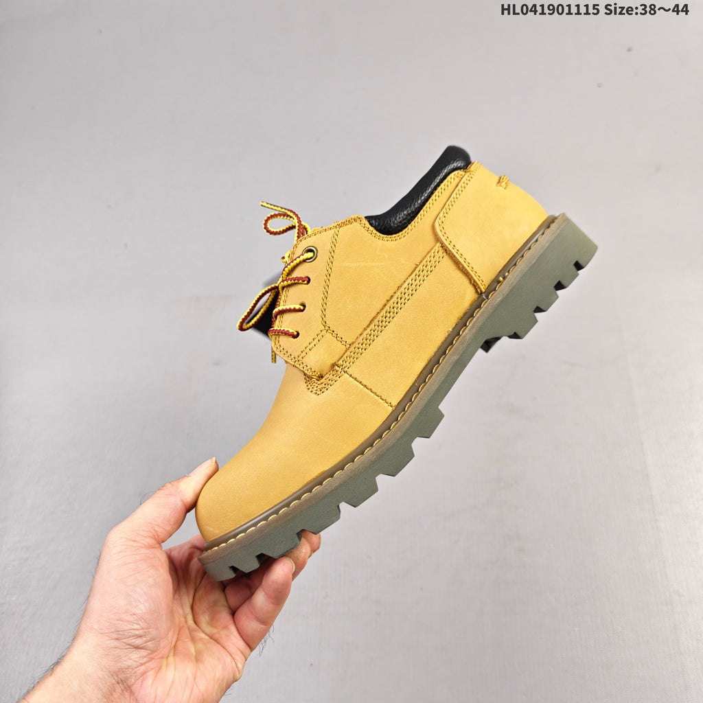 CAT Low-Top Lace-Up Work Boots in Honey in Yellow - product image from the listing.