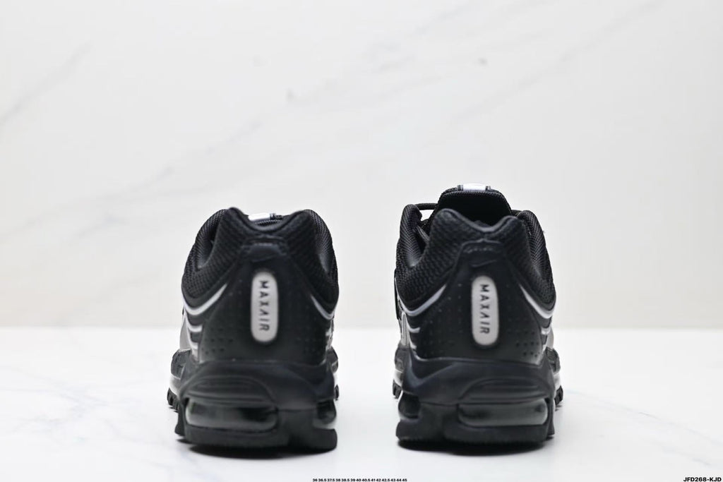 Nike Air Max Plus Sneakers in Black Silver - product image from the listing.
