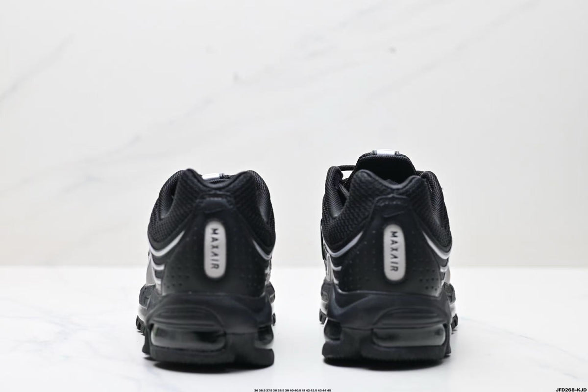 Nike Air Max Plus Sneakers in Black Silver - product image from the listing.