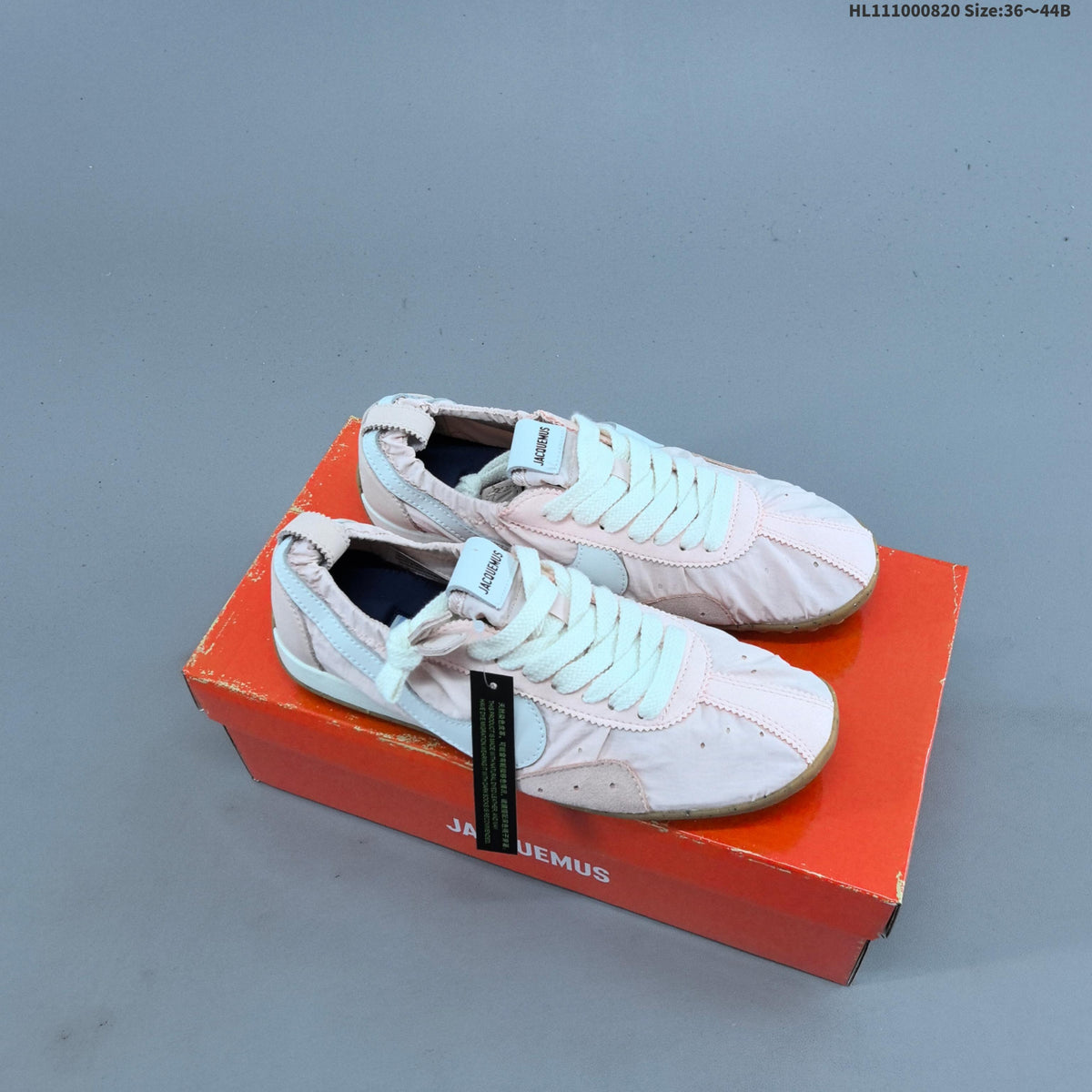 Pink Jacquemus x Nike Jacumoon Low-Top Sneakers - product image from the listing.