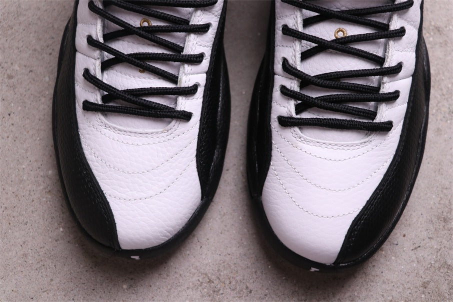 Air Jordan 12 Reverse Flu Game Sneakers White Black Gold - product image from the listing.