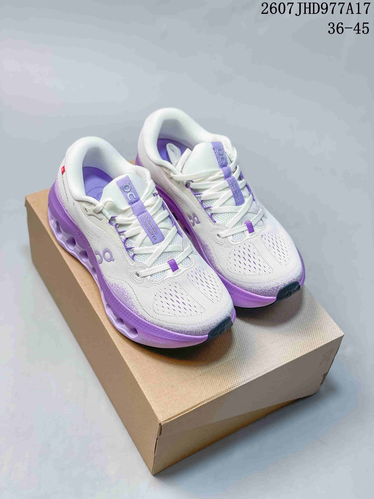 On Cloudtilt Trainers White with Purple or Orange Accents - product image from the listing.