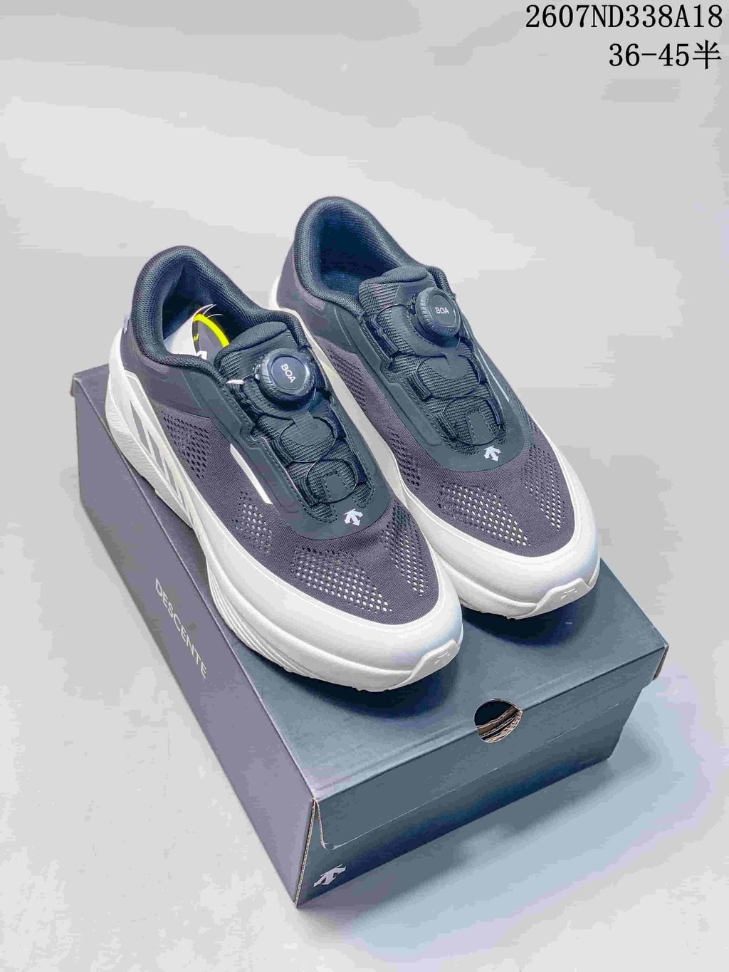 White and Black Descente D.F. Wire 3.0 Sneakers - product image from the listing.