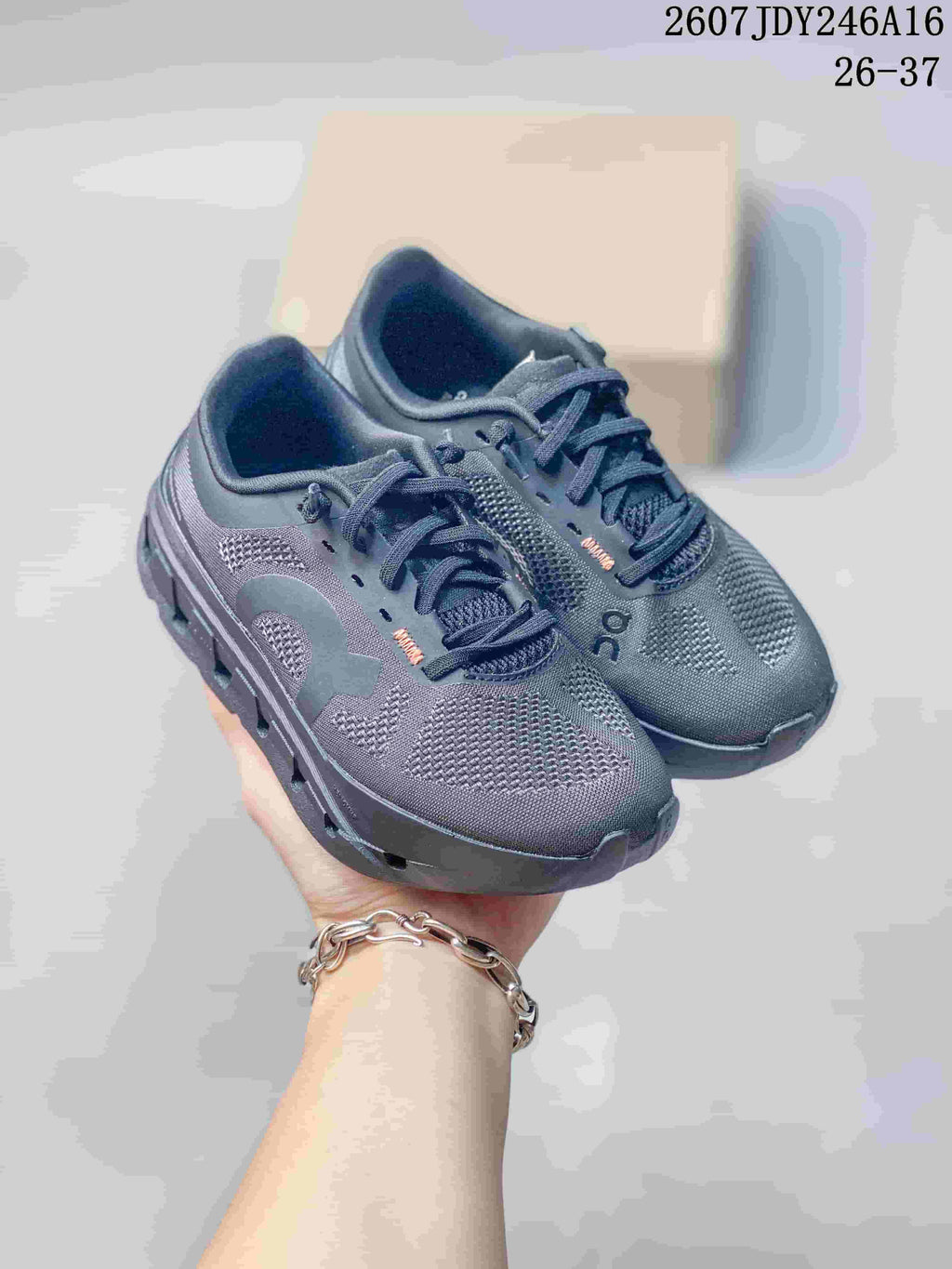 On Cloudstratus 3 Kids' Sneakers in Dark Gray - product image from the listing.