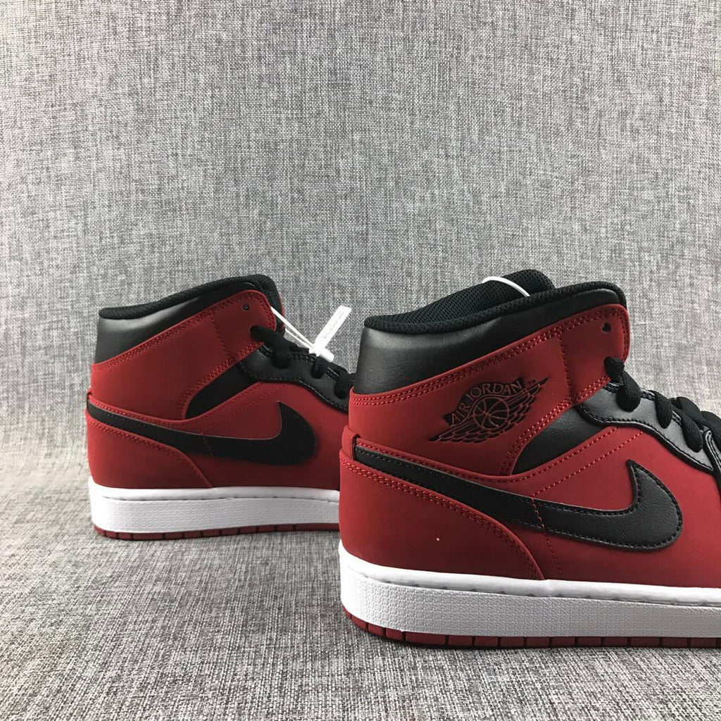 Air Jordan 1 Mid Sneakers in Red, in Black and White - product image from the listing.