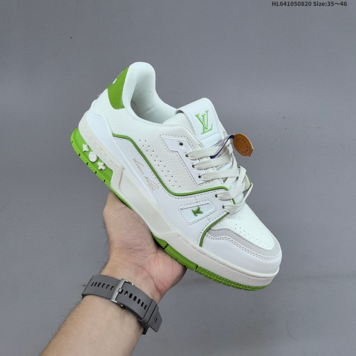 Louis Vuitton Trainer Low-Top Sneakers, in White and Green/Blue - product image from the listing.