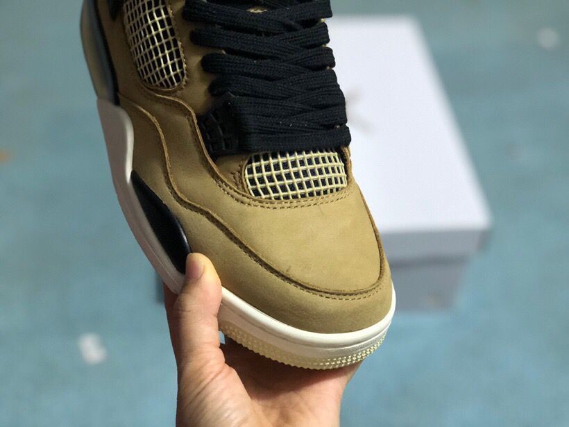 Jordan 4 Retro Sneakers in Tan Black - product image from the listing.