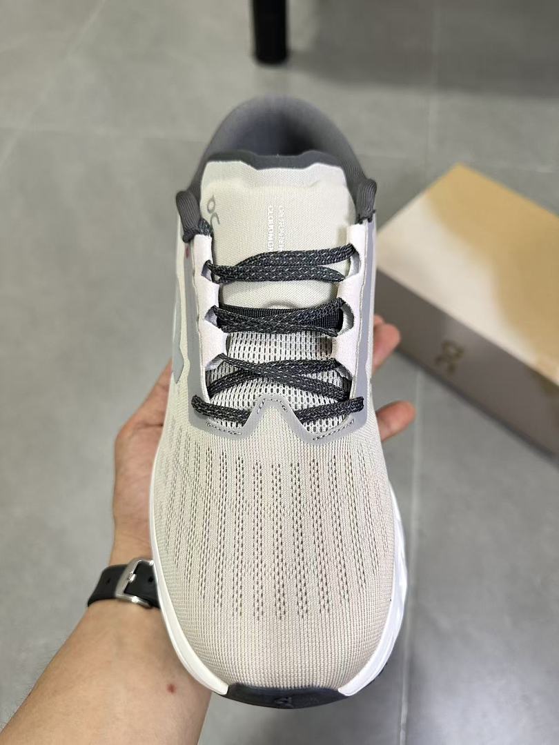 Gray and White On Running Cloudmonster Sneakers - product image from the listing.