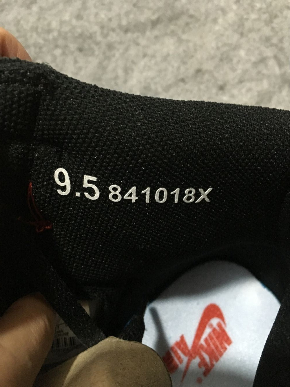 Air Jordan 1 High Sneakers in Black and Red - product image from the listing.