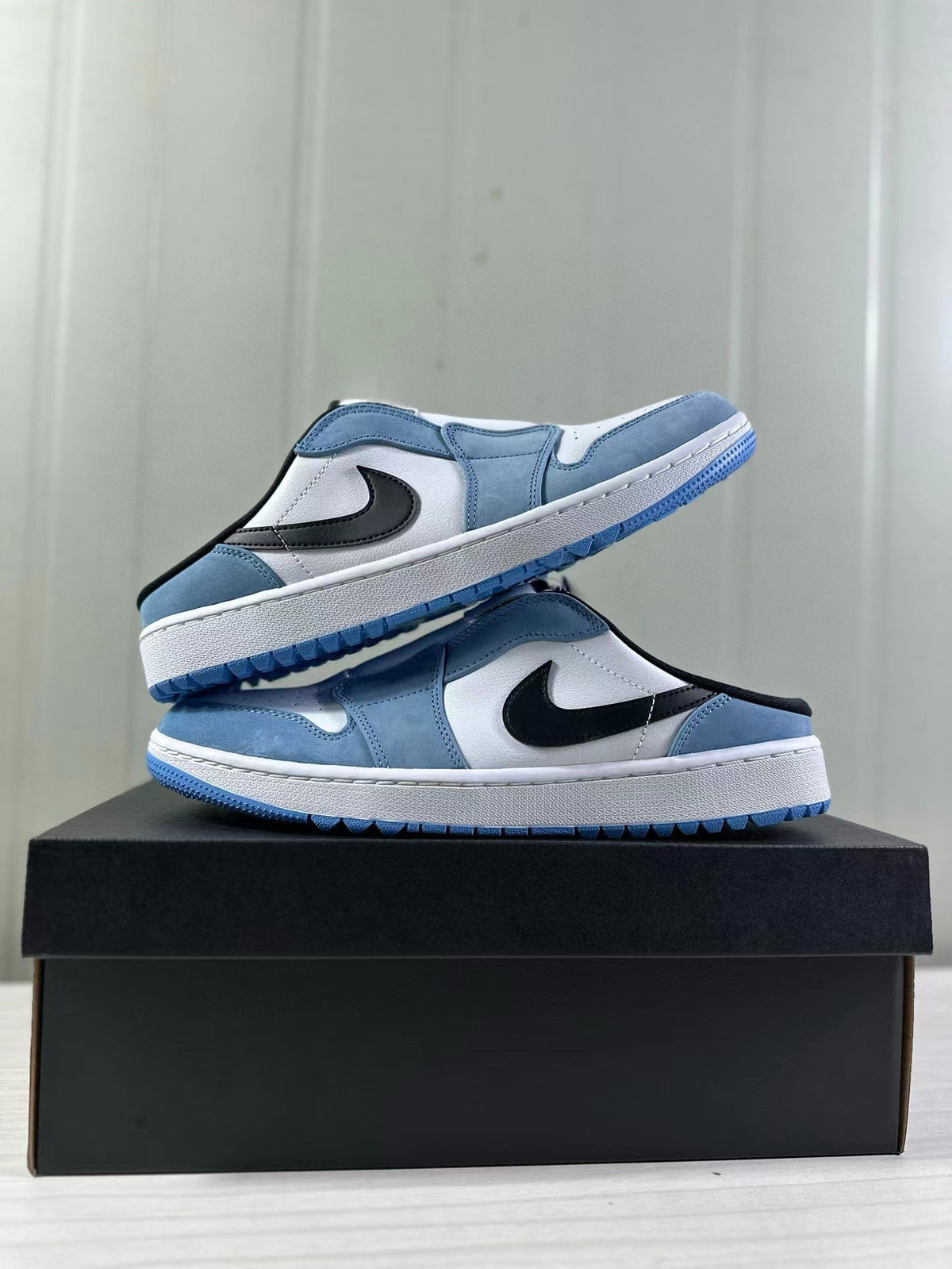 Air Jordan 1 Mule Low Blue White Black FJ1214-400 - product image from the listing.