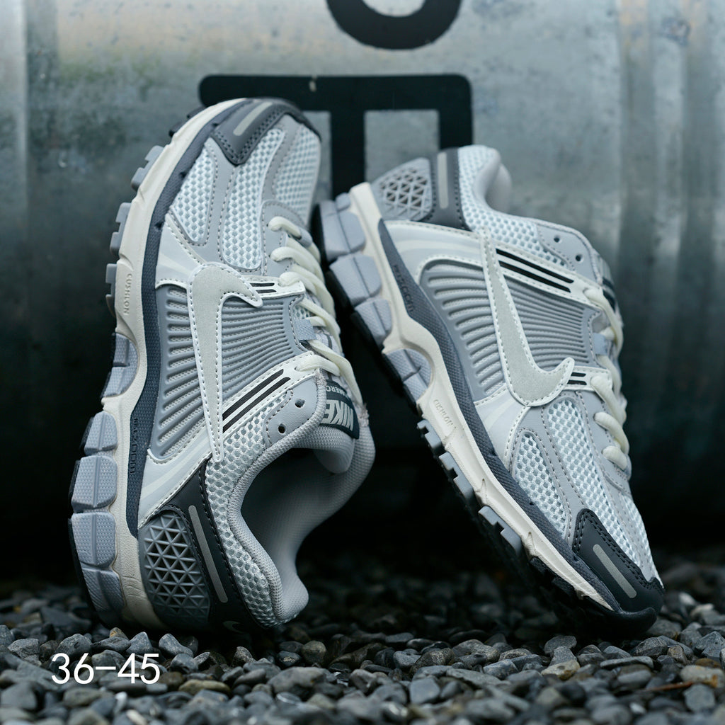 Light Gray and Navy Nike Air Zoom Vomero 5 Sneakers - product image from the listing.