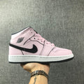 Air Jordan 1 Mid High-Top Sneakers in Pink and Black - product image from the listing.