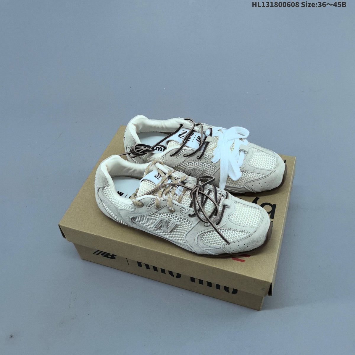 Miu Miu x New Balance 530 SL Low-Cut Sneakers - product image from the listing.