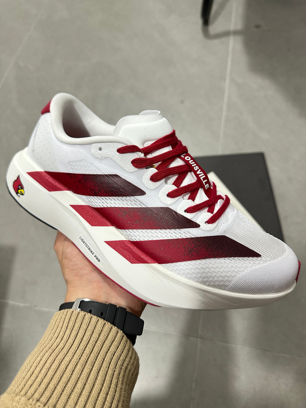 adidas Lightstrike Pro Running Shoes in White Burgundy - product image from the listing.