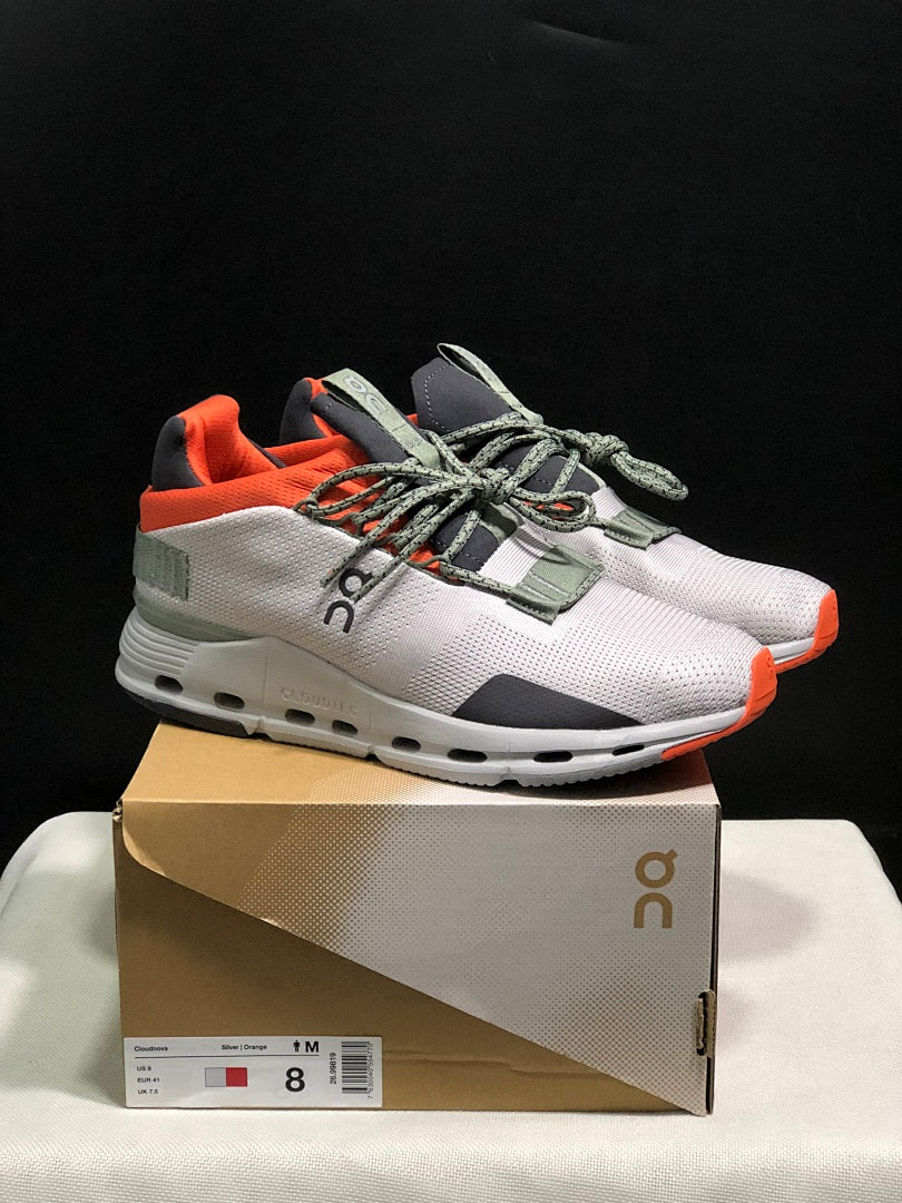 On Cloudnova 1 Sneakers, in Silver and Orange - product image from the listing.