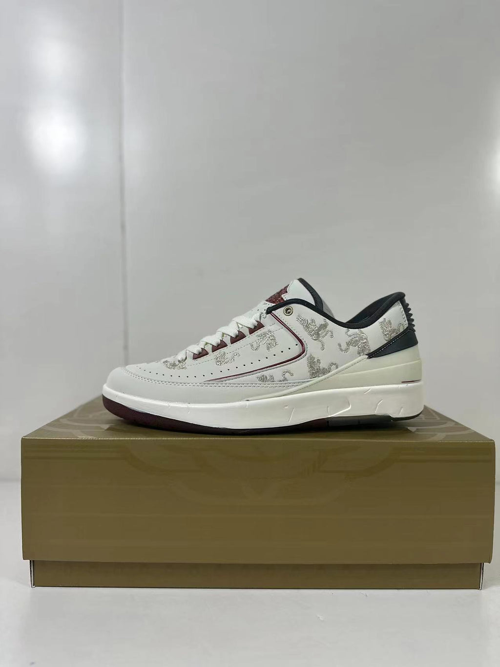 Air Jordan 2 Low Chinese New Year White FJ5736-100 - product image from the listing.
