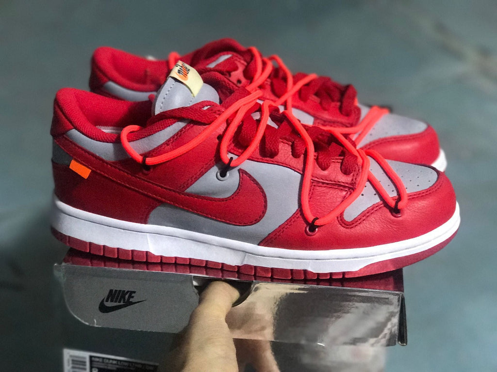 Nike Dunk Low LTHR / OW Sneakers in Red Gray CT0856-600 - product image from the listing.