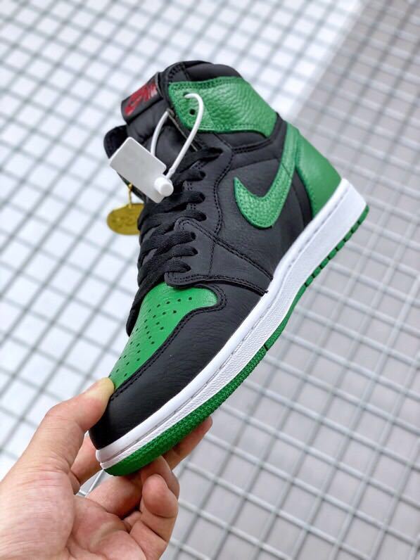 Air Jordan 1 Pine High-Top Sneakers in Green - product image from the listing.