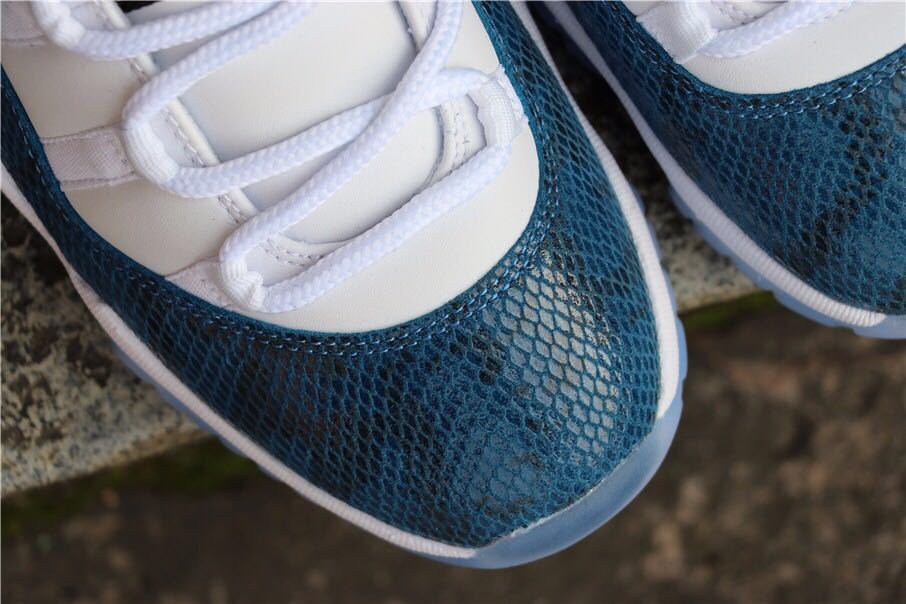 Navy Snakeskin Sneakers - Air Jordan 11 Low - product image from the listing.