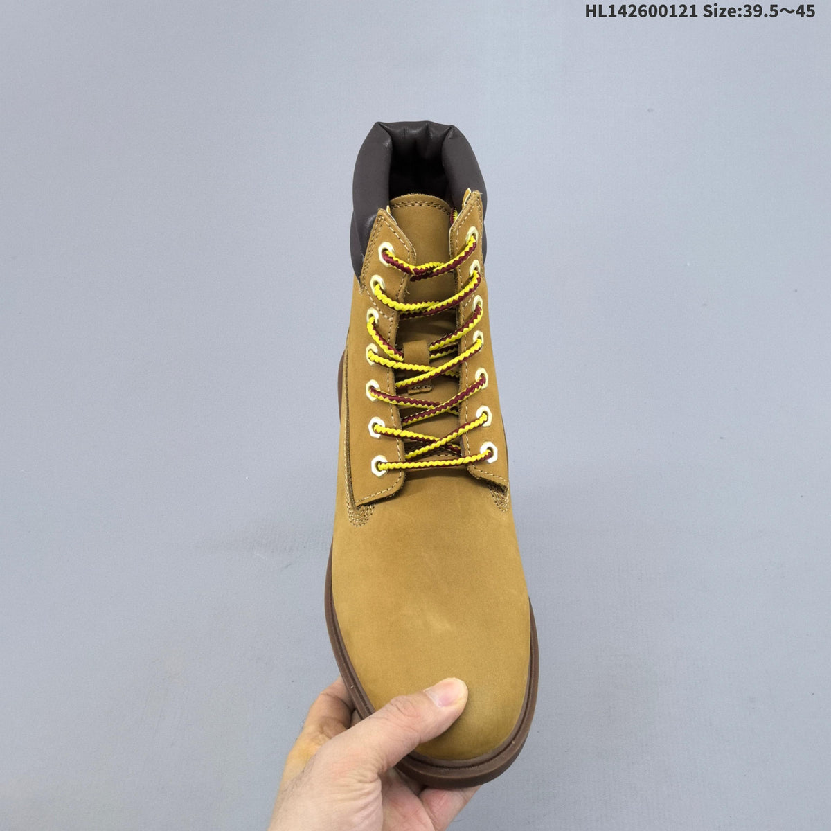 Yellow Mid-Top Lace-Up Boots by Timberland - product image from the listing.