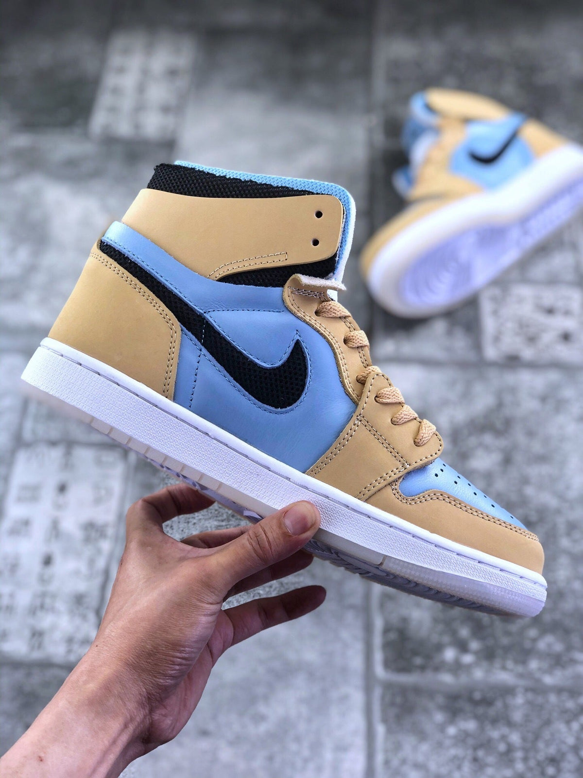 Air Jordan 1 Zoom CMFT Blue Tan Sneakers CT0979-400 - product image from the listing.