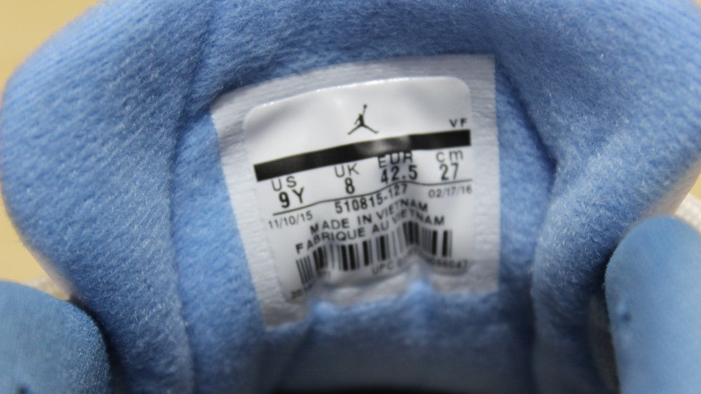 Air Jordan 12 High-Top Sneakers in University Blue 510815-127 - product image from the listing.
