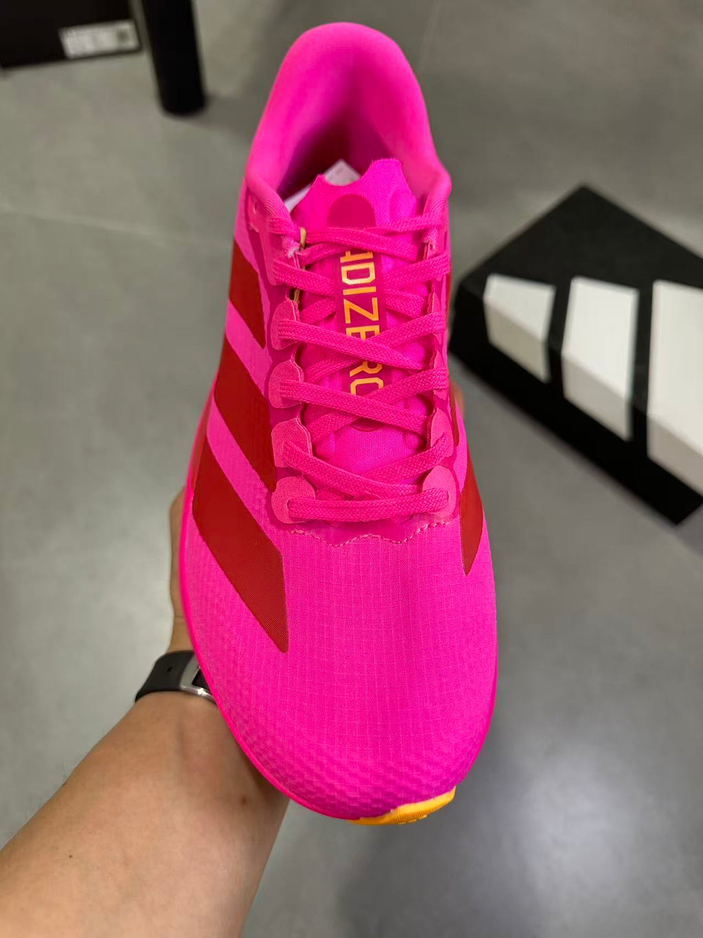 Magenta adidas Lightstrike Pro Running Shoes KI6902 - product image from the listing.