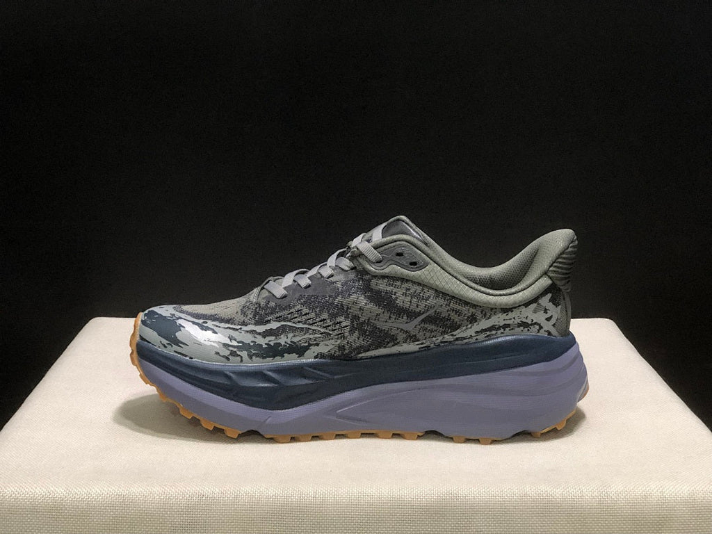 Gray HOKA Stinson 7 Trail Running Shoes - product image from the listing.
