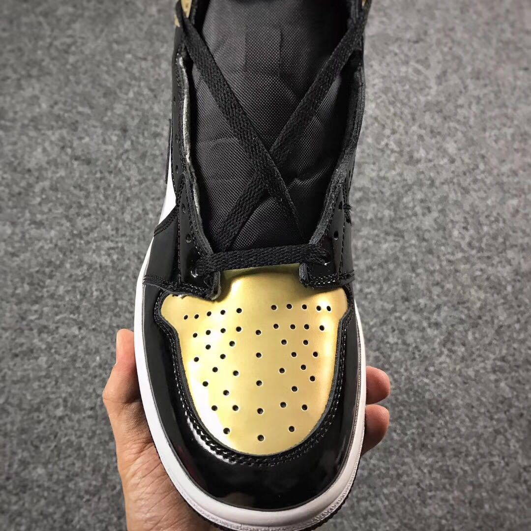 Jordan 1 High Mismatched Sneakers in Black Gold White - product image from the listing.