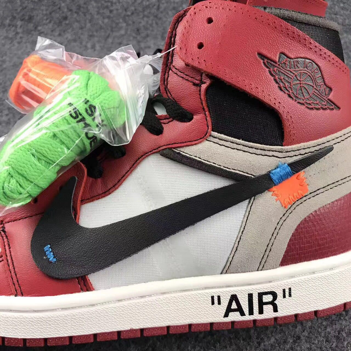 Off-White x Air Jordan 1 High Sneakers, in Red and White - product image from the listing.