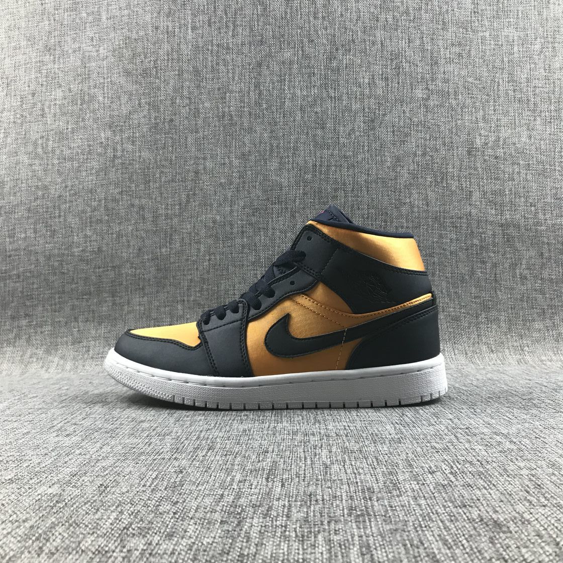 Air Jordan 1 Mid SE Sneakers in Black and Gold 852542-401 - product image from the listing.